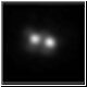 Sono praticamente due asteroidi gemelli che 
ruotano l'uno attorno all'altro
- gif animata da 60 kb